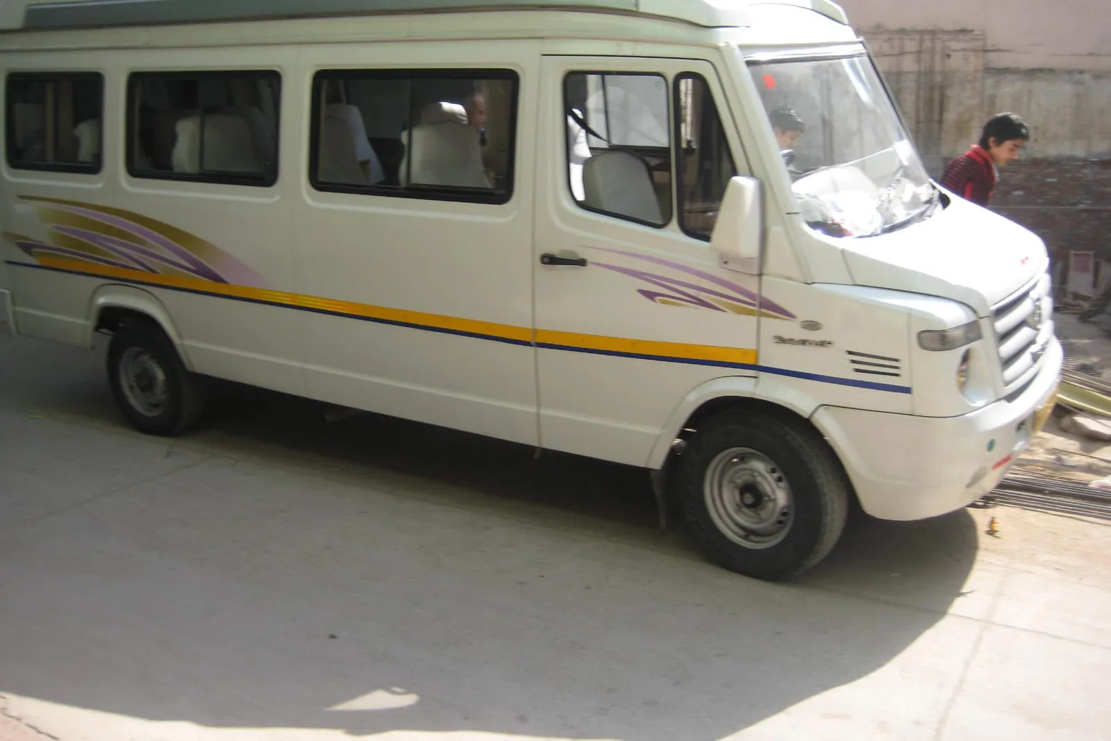 14-seater AC traveller mini van for group temple tours