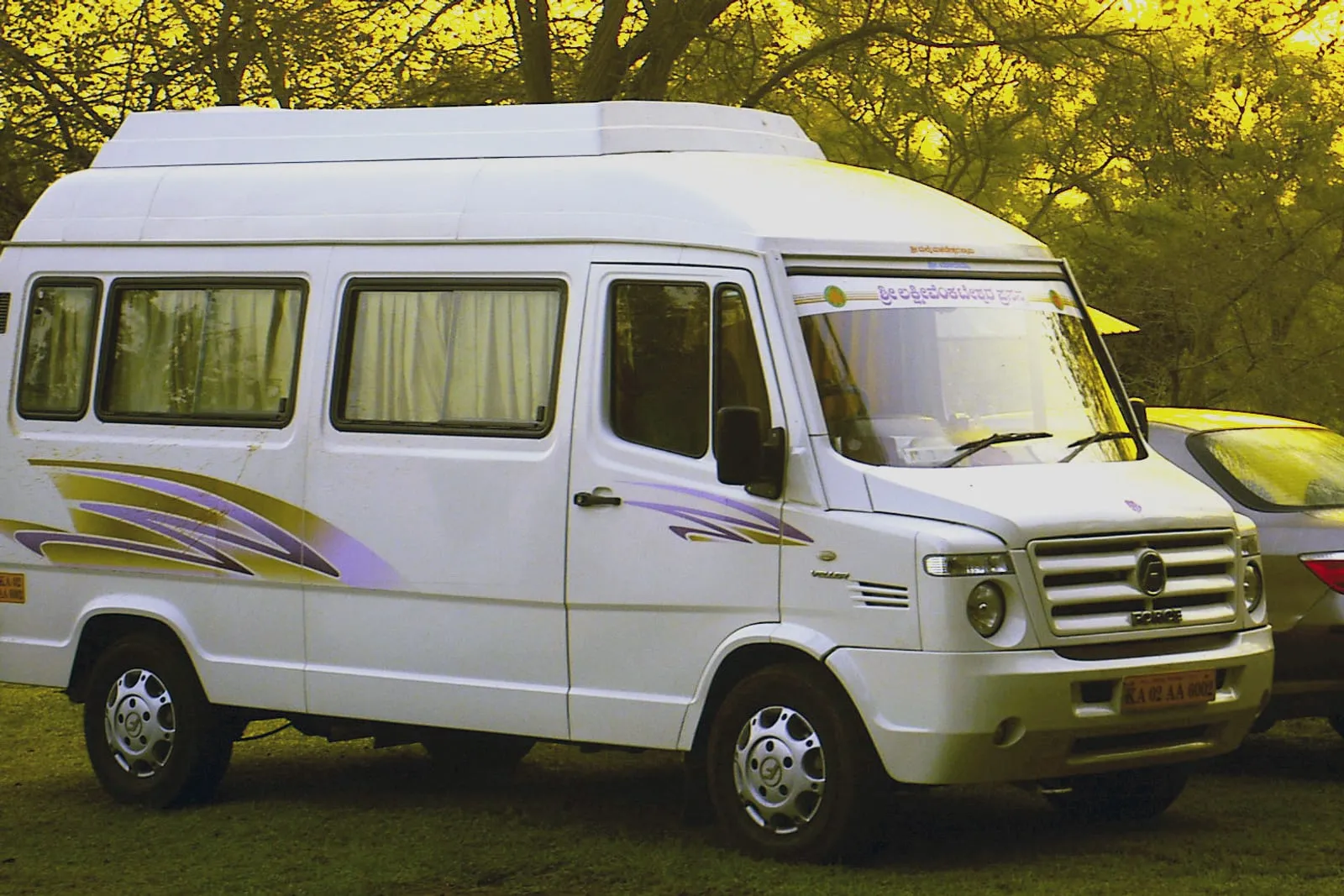 14-seater non-AC traveller mini van for group pilgrimages